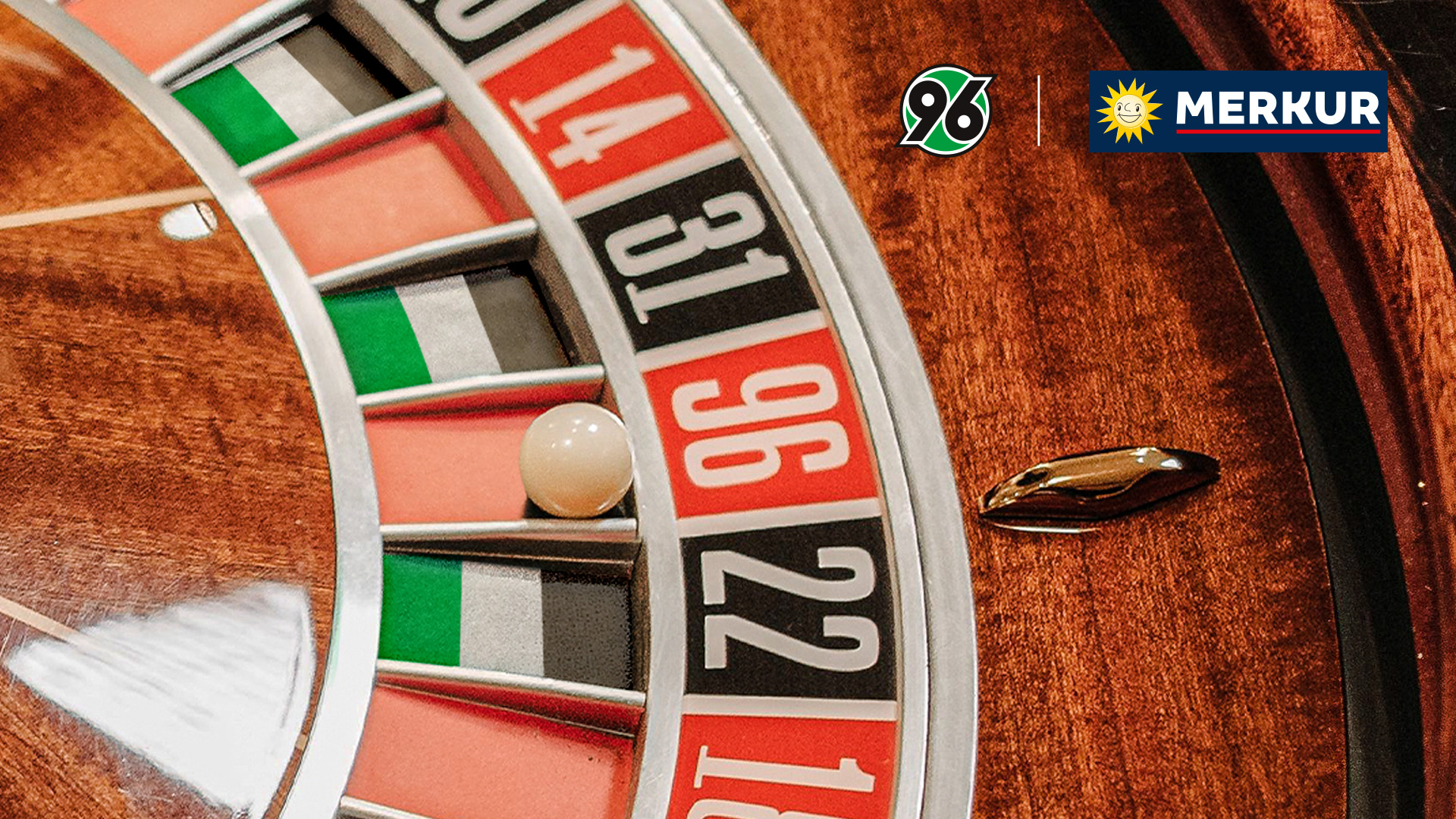 Ausschnitt eines Roulette-Tisches mit schwarz-weiß-grünen Feldern und einer Kugel im Feld mit der 96.