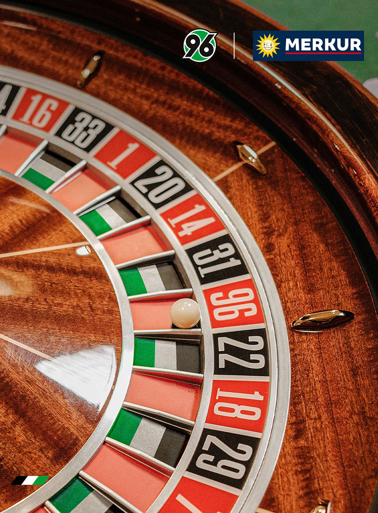 Ausschnitt eines Roulette-Tisches mit schwarz-weiß-grünen Feldern und einer Kugel im Feld mit der 96.