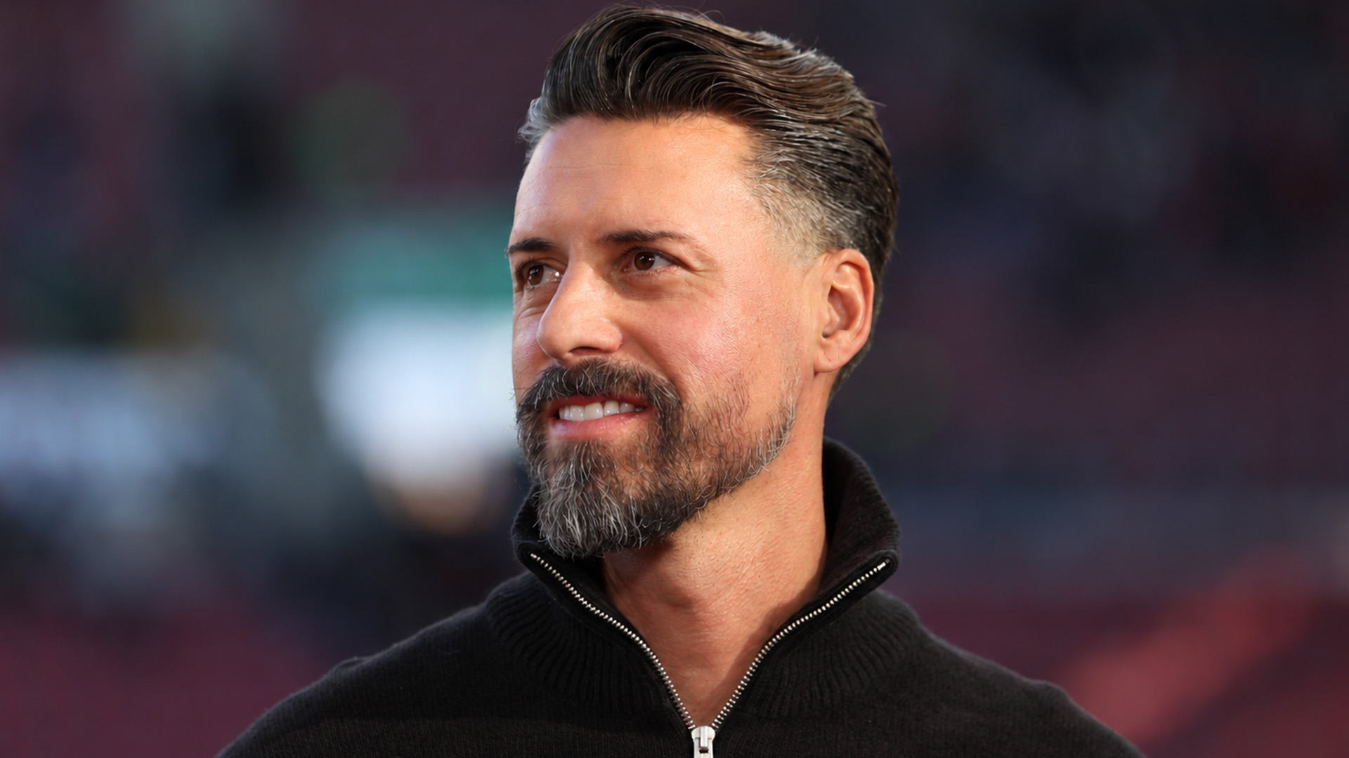 Sandro Wagner im Portait am Lächeln.